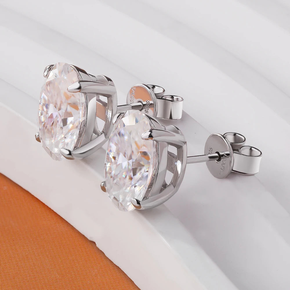 Oval moissanite earrings from Corporación Turística featuring 1-4 carat high-quality stones, elegant and sparkling jewelry design.