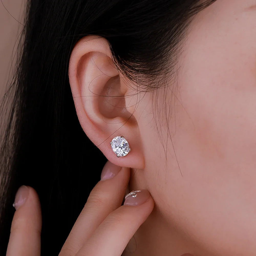 Oval moissanite earrings from Corporación Turística featuring 1-4 carats, showcasing high-quality sparkle and elegant design.