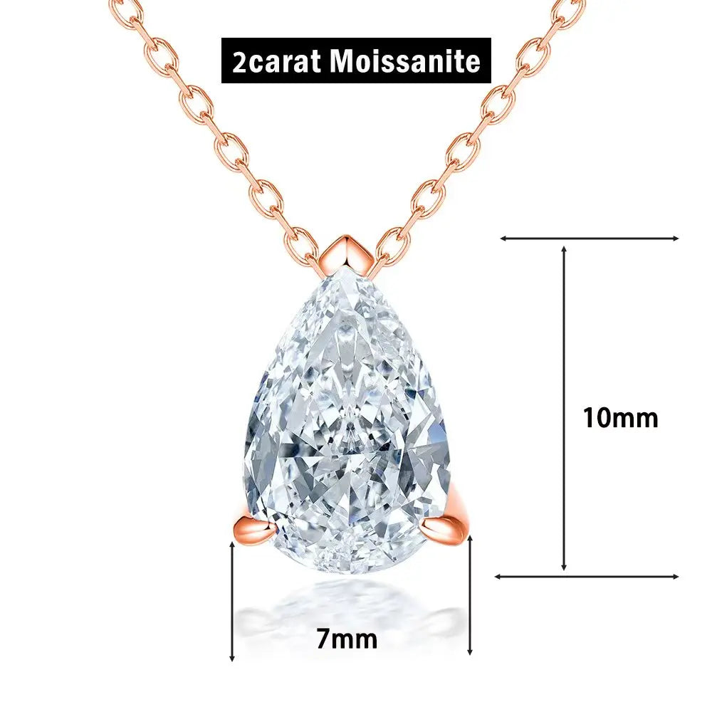 Silver moissanite pendant necklace with teardrop-shaped gemstone, elegant jewelry by Corporación Turística.