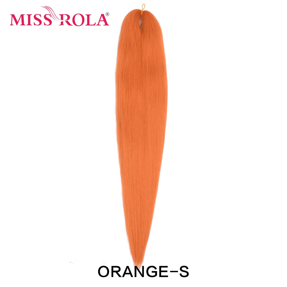 Miss Rola synthetic 26-inch hair extension in Kanekalon, 75g, featuring layered, wavy black hair for a natural look.
