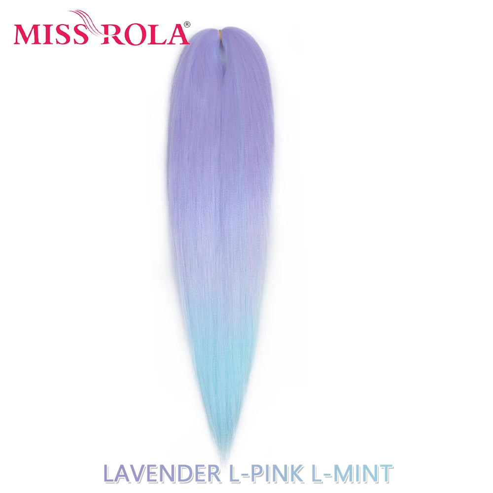 Miss Rola synthetic 26-inch Kanekalon hair extensions, 75g, with a natural black color, styled in soft, wavy strands.