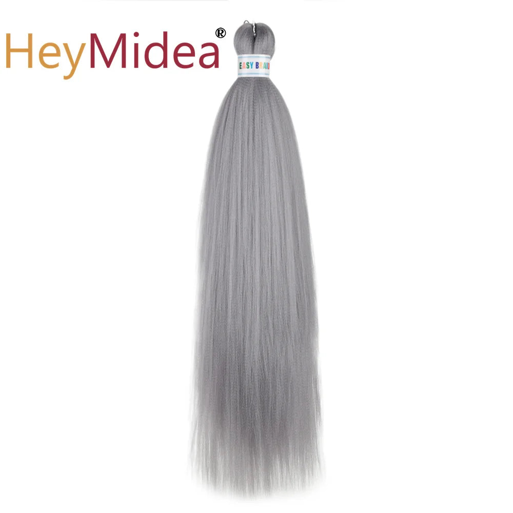 Synthetic 26-inch hair extensions from Corporación Turística, shown in a natural style with long, flowing strands.