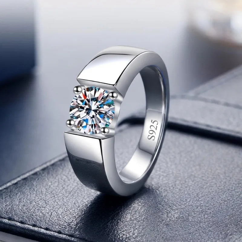 Sterling silver men's ring with 8mm moissanite D VVS clarity, polished band showcasing elegant jewelry design