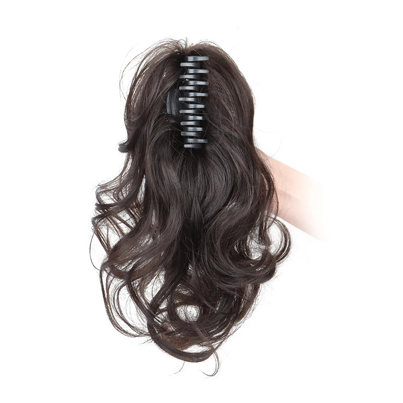 Synthetic 12-inch ponytail hair extensions by Corporación Turística, shown in a natural black color.
