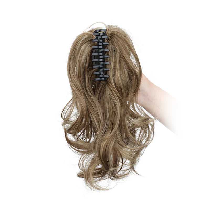 Synthetic 12-inch ponytail hair extensions from Corporación Turística, featuring long, sleek, black hair for quick styling.