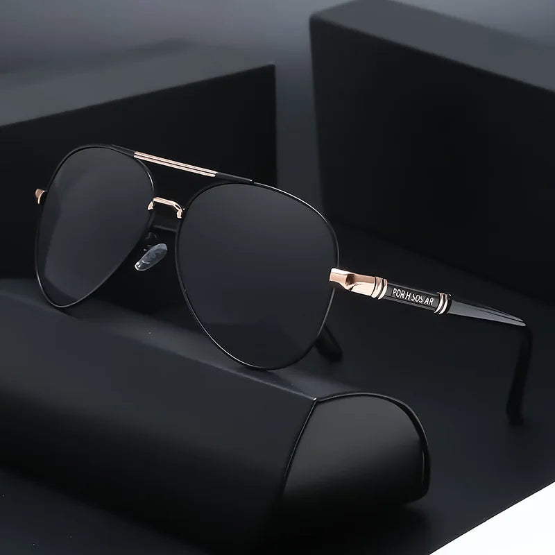 Pair of retro polarized sunglasses for men with dark lenses and thick black frames, from Corporación Turística.