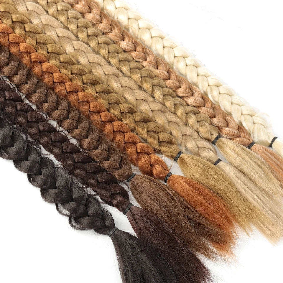 Trenzed horsehair extensions by Corporación Turística, styled in a sleek, natural-looking ponytail with braided details.
