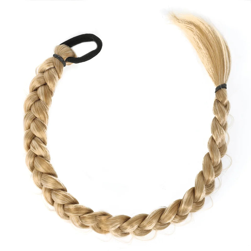 Trenzed ponytail hair extensions by Corporación Turística, showing long, braided synthetic hair for added volume and style.