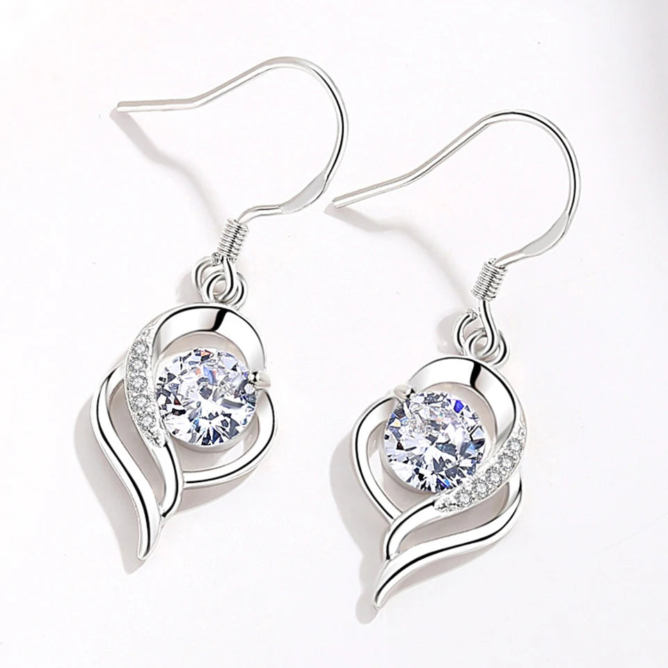 Water drop zircon earrings for women featuring sparkling cubic zirconia, elegant dangle earrings for women.