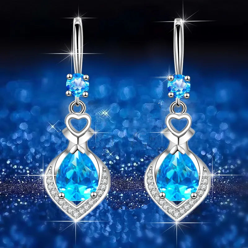 Water drop cubic zirconia earrings for women, silver-tone drop earrings, elegant jewelry by Corporación Turística