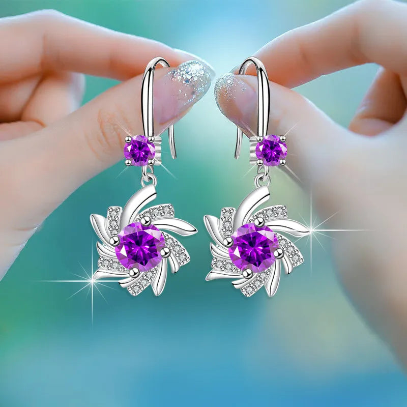 Waterdrop zircon earrings for women, dangling jewelry with sparkling stones, stylish and elegant accessory.