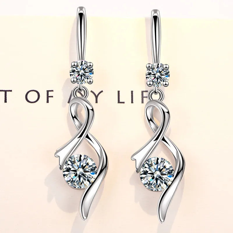 Water drop-shaped cubic zirconia earrings for women, elegant dangling earrings with sparkling stones.