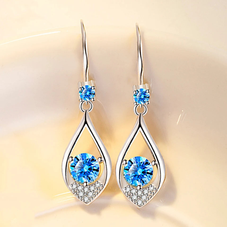Silver drop earrings with sparkling cubic zirconia stones for women, featuring elegant water drop design.