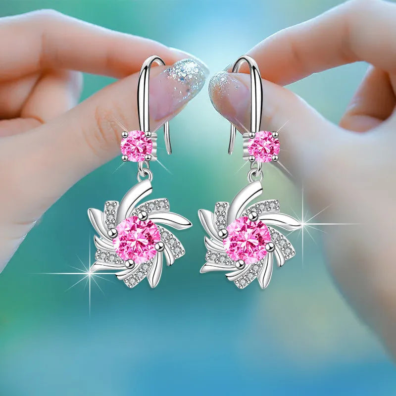 Waterdrop cubic zirconia drop earrings for women, elegant silver-tone jewelry with sparkling stones.