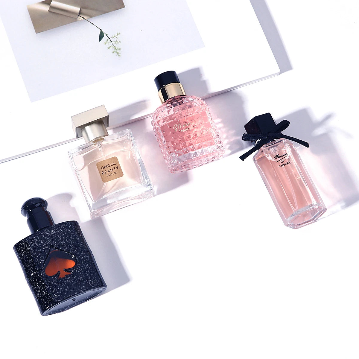 FloralVerse 4-in-1 perfume gift box by Corporación Turística, featuring a floral-themed collection of four perfume bottles.