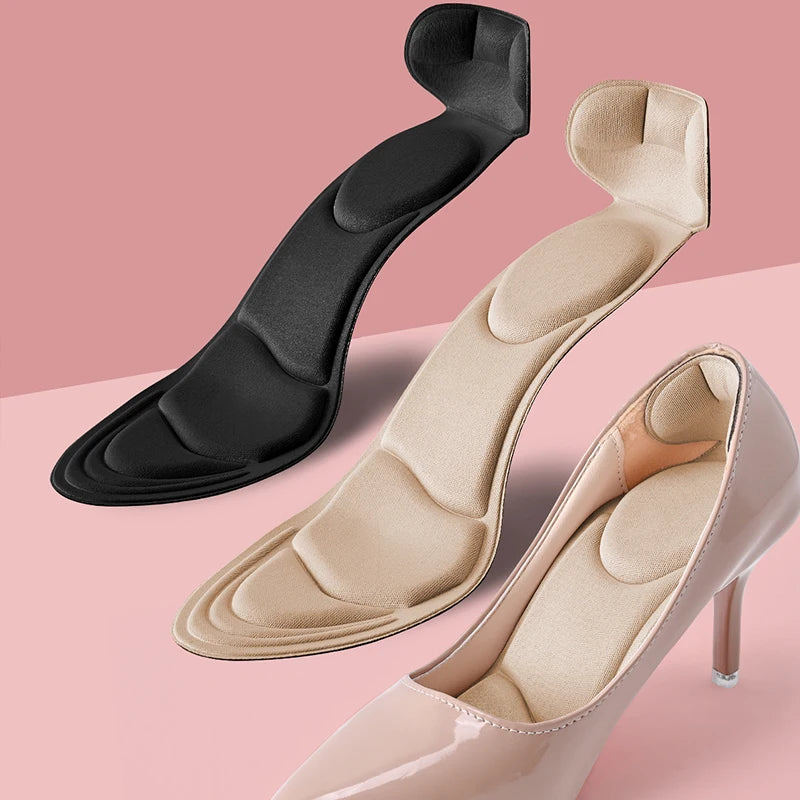 Four pairs of black memory foam insoles for women's shoes from Corporación Turística, designed for comfort and support.