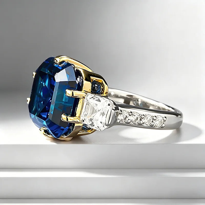 Elegant solid 18K white platinum jewelry from Corporación Turística featuring a blue gemstone.