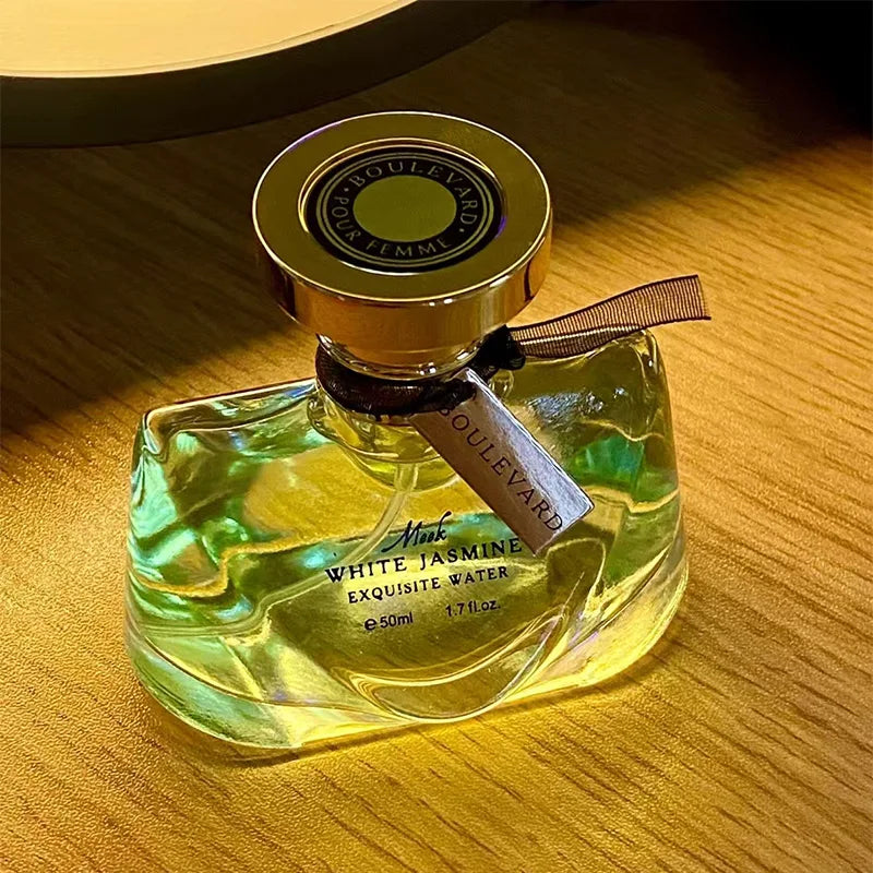 Luxurious 50ml jasmine nocturne perfume spray by Corporación Turística with elegant bottle design.