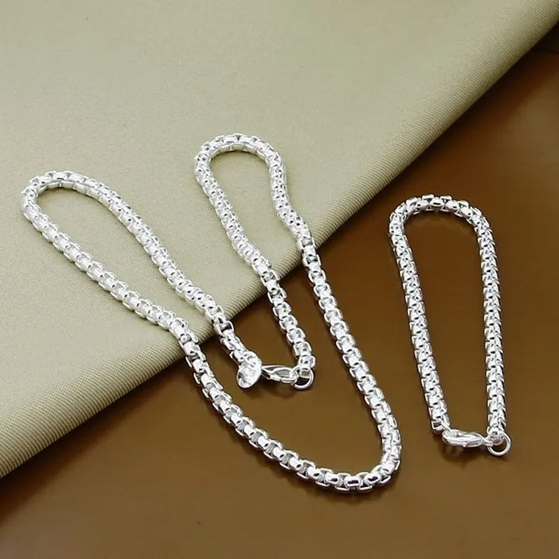Sterling silver 925 chain, 45-60cm length, 4mm thick, displayed in a jewelry box, from Corporación Turística.