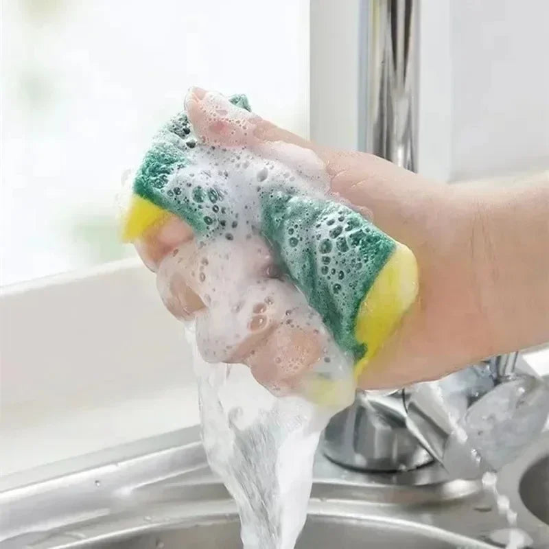 Set of 50 double-sided magic cleaning sponges by Corporación Turística, highly absorbent and suitable for various cleaning tasks.