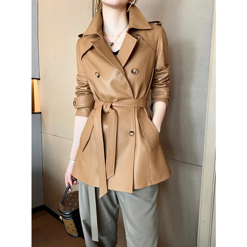 Genuine leather women's jacket by Corporación Turística, stylish warm coat with a sleek black leather finish.
