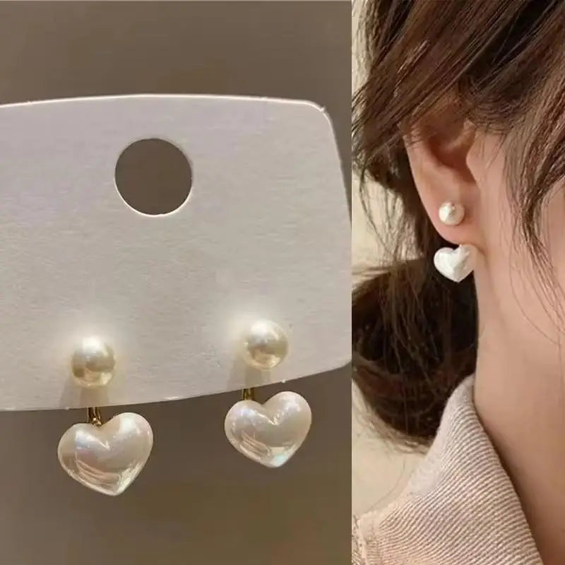 Silver 92% crystal hollow swan earrings featuring elegant needle design, perfect for sophisticated jewelry style.