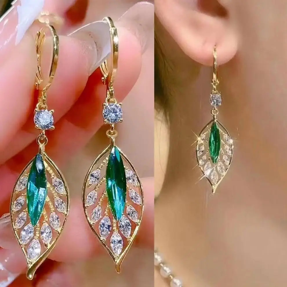 Purple crystal heart drop earrings for women, featuring elegant gemstone pendants from Corporación Turística.