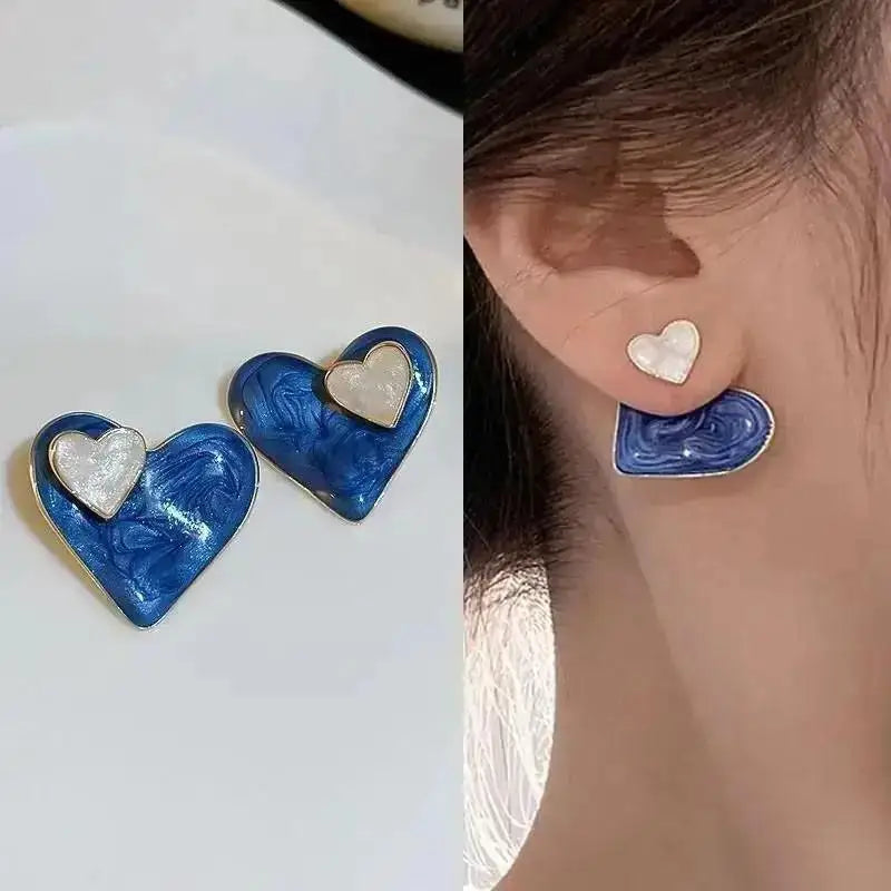 Purple crystal heart drop earrings for women, featuring elegant gemstone design from Corporación Turística.