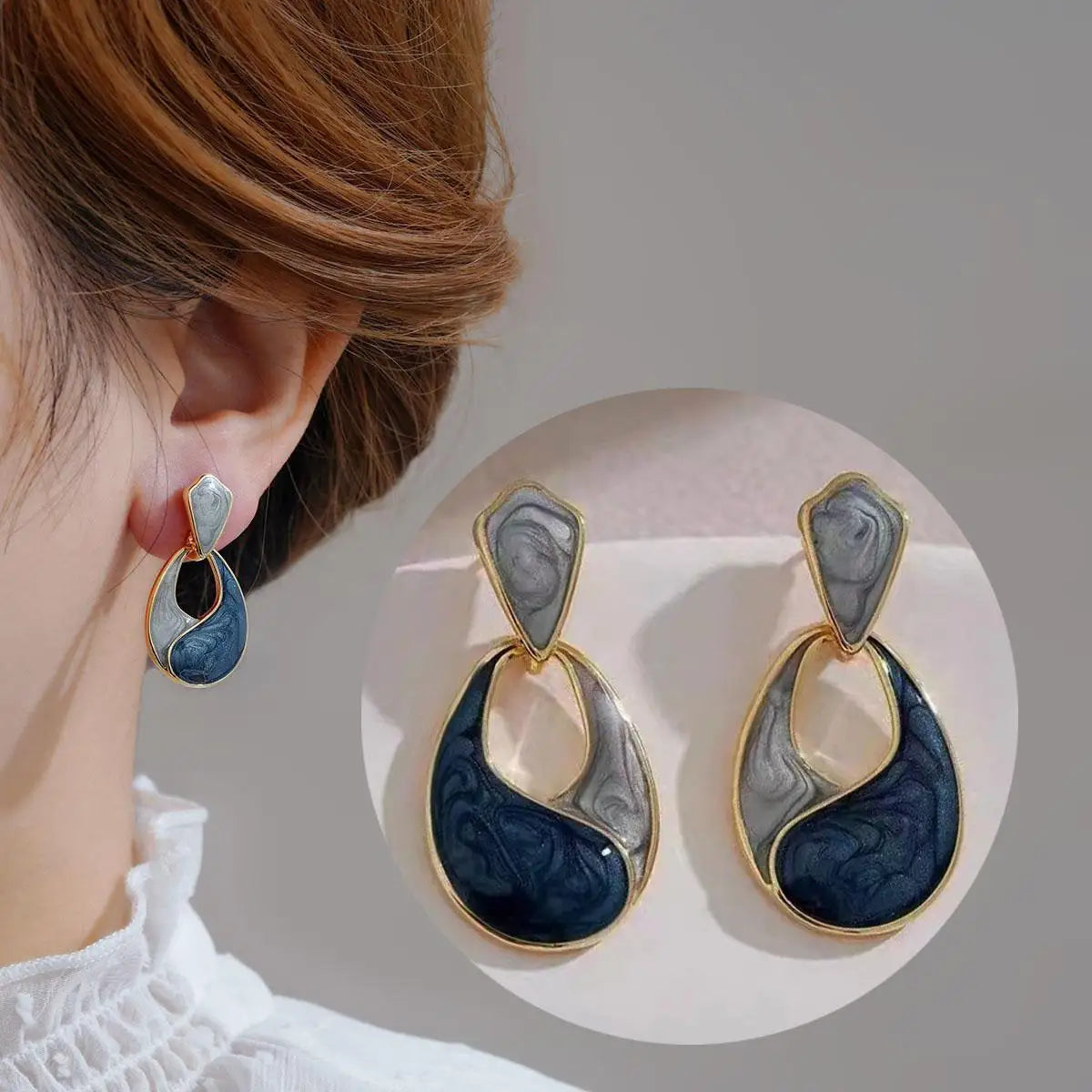 Purple crystal heart drop earrings for women, featuring elegant teardrop design by Corporación Turística.