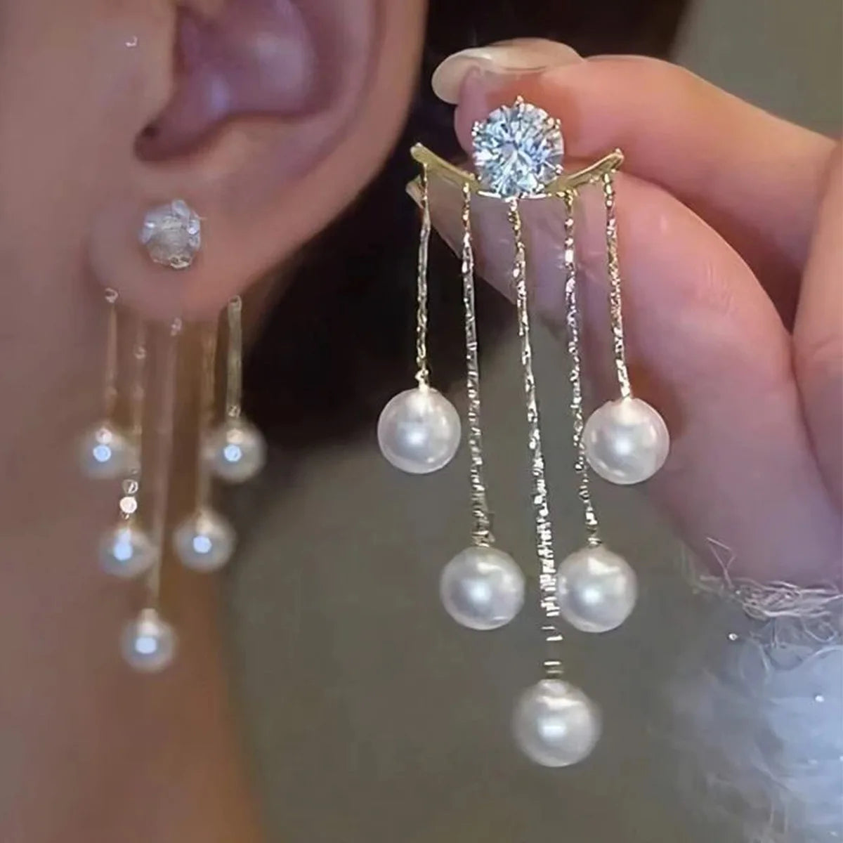 Korean fashion pearl tassel earrings with needle detail, featuring 5mm crystal beads and elegant design for stylish wear.