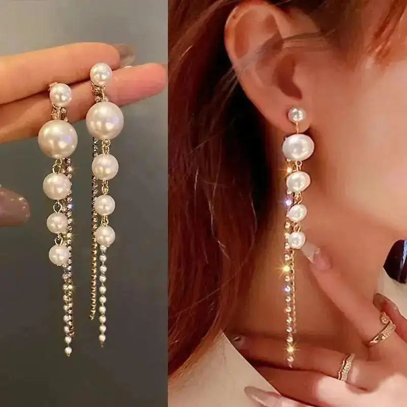 Korean fashion pearl tassel earrings with needle post, white pearl beads, stylish jewelry by Corporación Turística