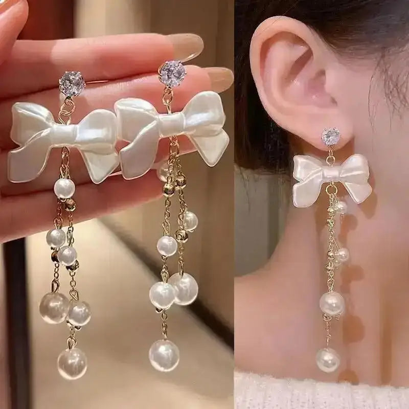 Korean fashion pearl tassel earrings with needle hook, white pearl beads, stylish and trendy accessory for women.