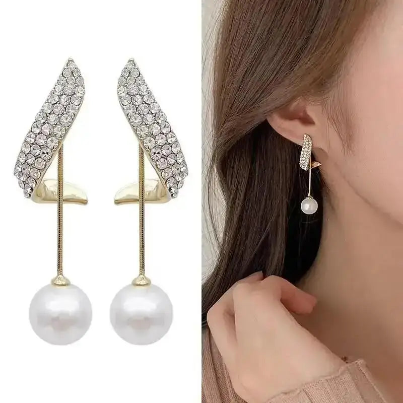 Korean fashion pearl tassel earrings with needle detail, featuring 5mm crystal beads, stylish and elegant jewelry by Corporación Turística