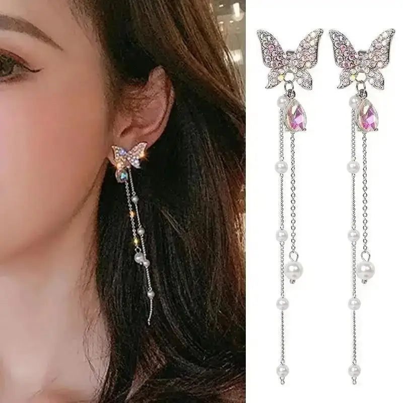 Korean fashion pearl tassel earrings with needle hook, white pearl beads, stylish jewelry accessory for women.