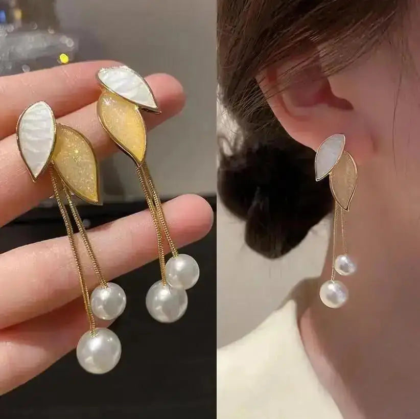 Korean fashion pearl tassel earrings with needle design, featuring 5mm crystals, stylish and elegant jewelry accessory.