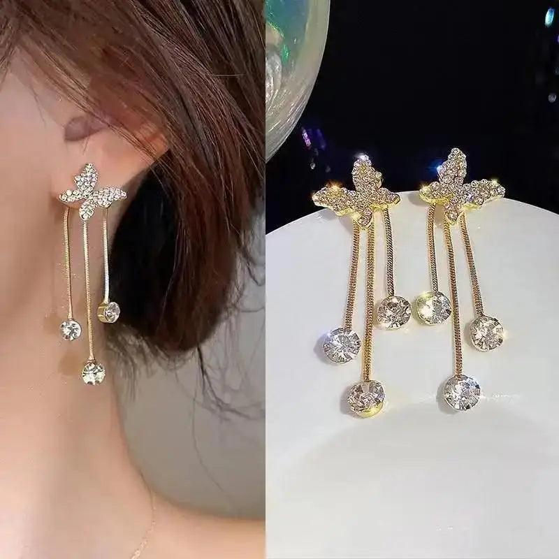 Elegant Korean-style pearl tassel earrings with crystal accents and needle hook, perfect for stylish accessories.