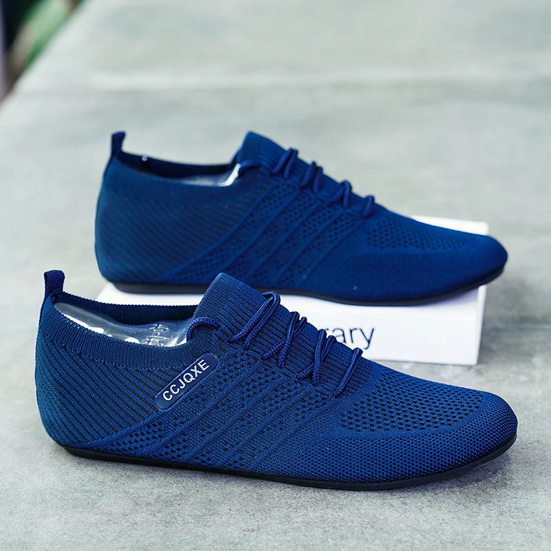 Red MAEDEF men's slippers from Corporación Turística, cozy indoor shoes with soft fabric and slip-on design for home use.