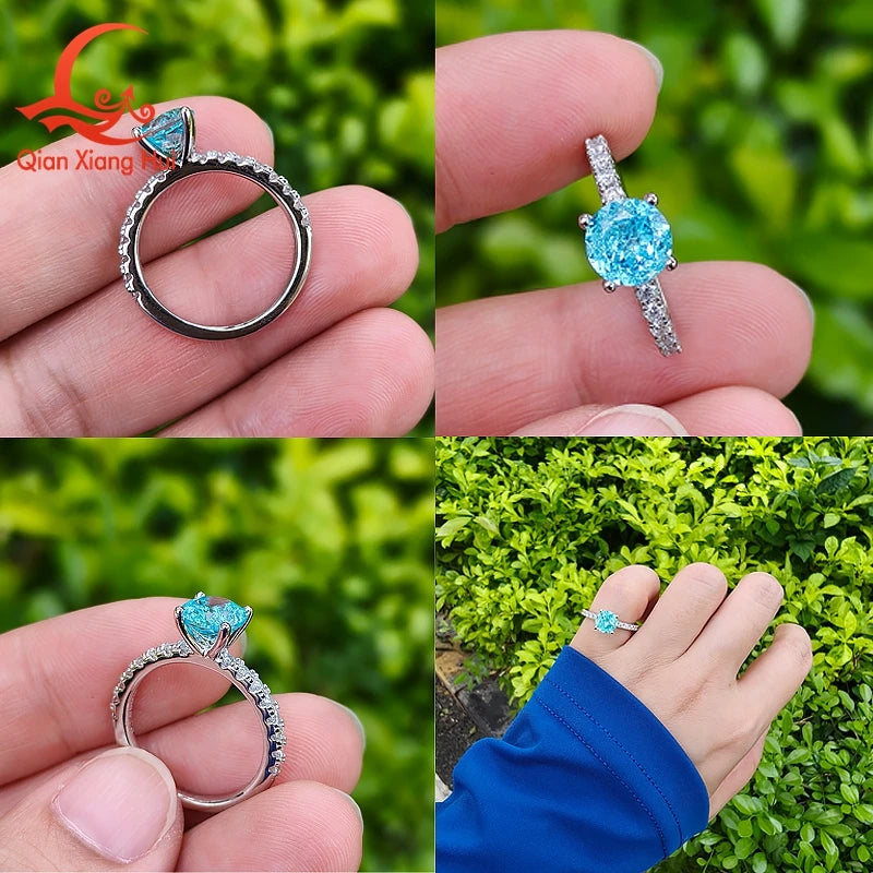 Silver ring featuring a 6.5mm neon blue-green Paraiba tourmaline and YAG gemstone, crafted by Corporación Turística.