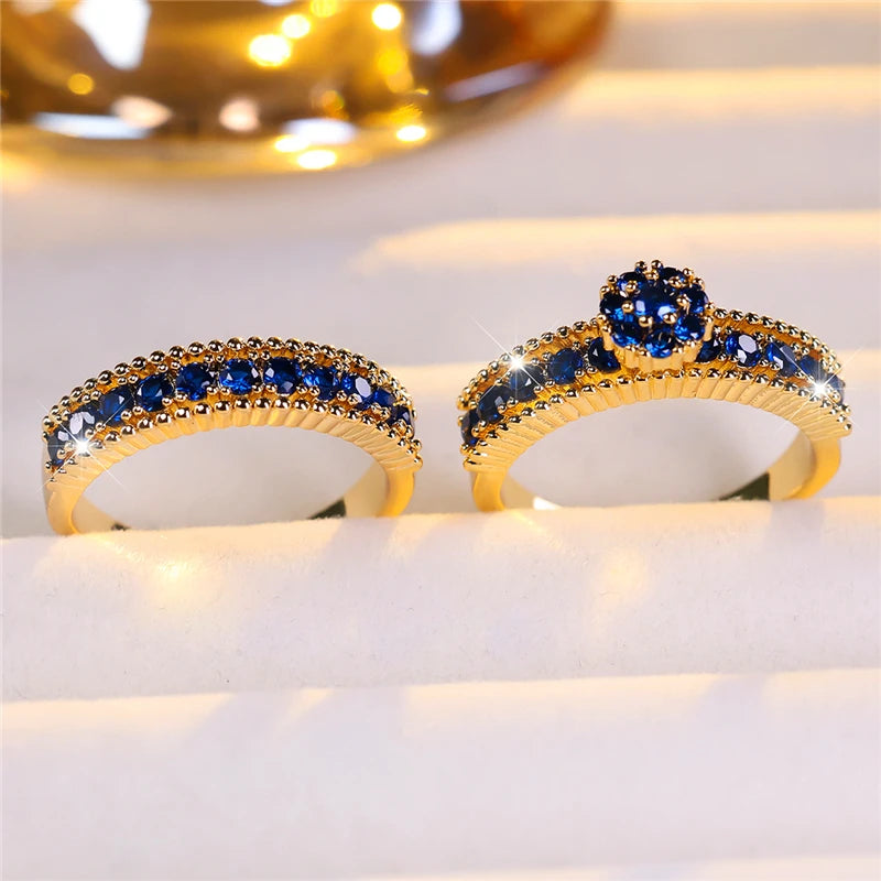 Set of turquoise zircon engagement rings showing detailed silver bands and sparkling stones, by Corporación Turística.