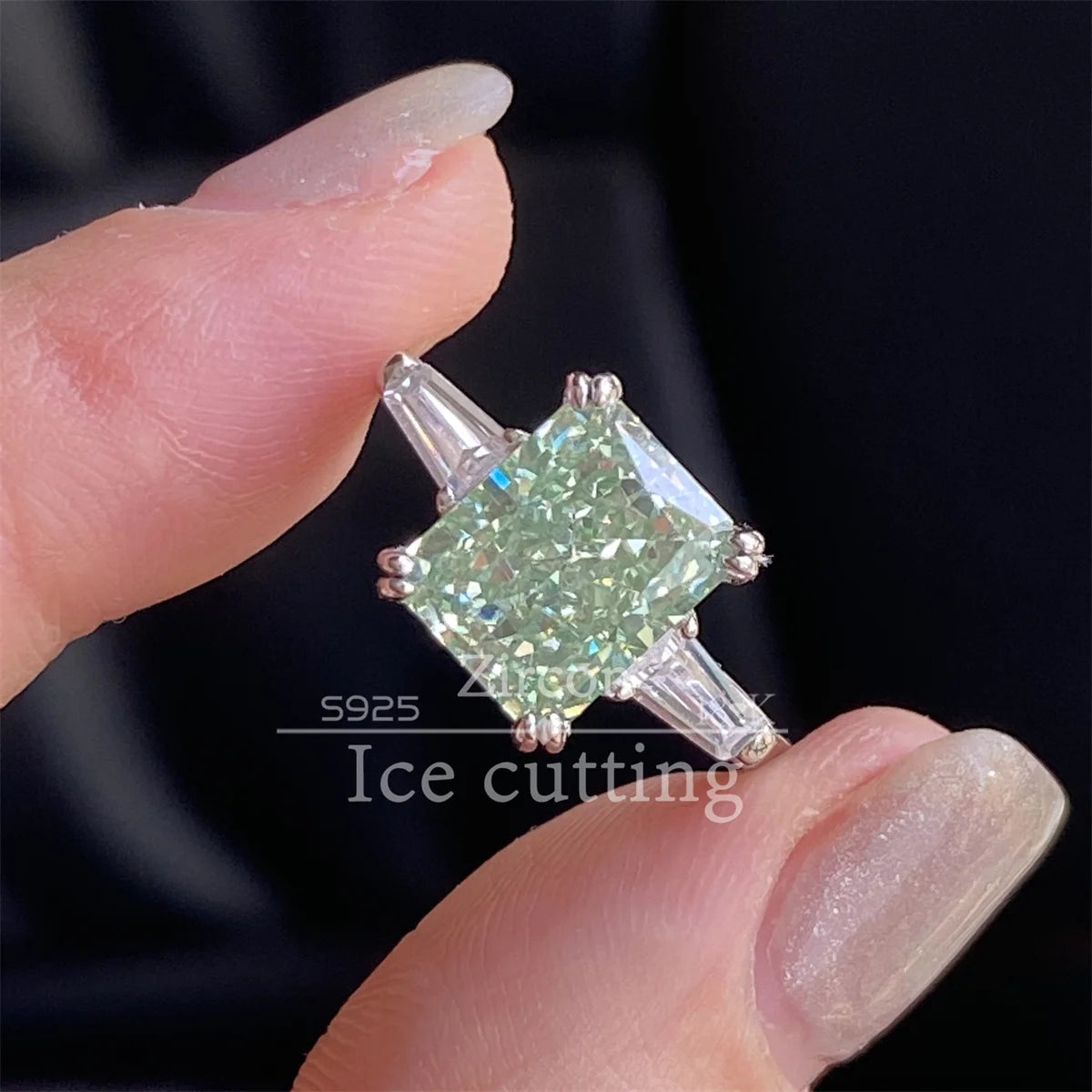 Sterling silver S925 ring with green mint cubic zirconia, featuring a stylish design, perfect for elegant jewelry collection.
