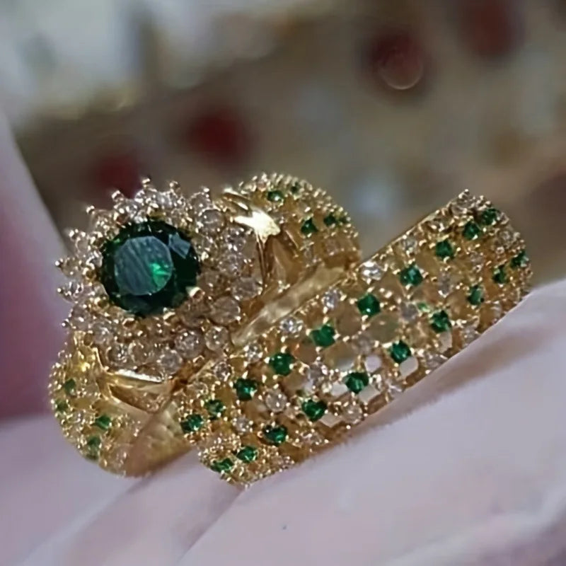 Cobre woman’s ring with embedded gemstones, featuring intricate design and decorative details, on a neutral background.