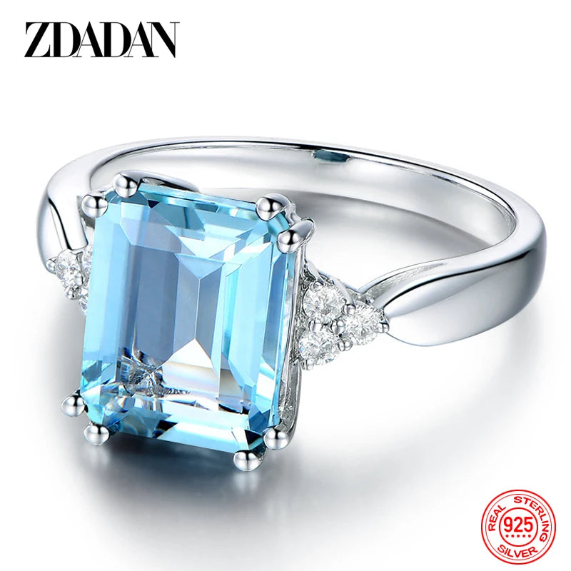 Elegant ZDADAN aquamarine gemstone ring for women featuring sparkling blue stones and a silver band.