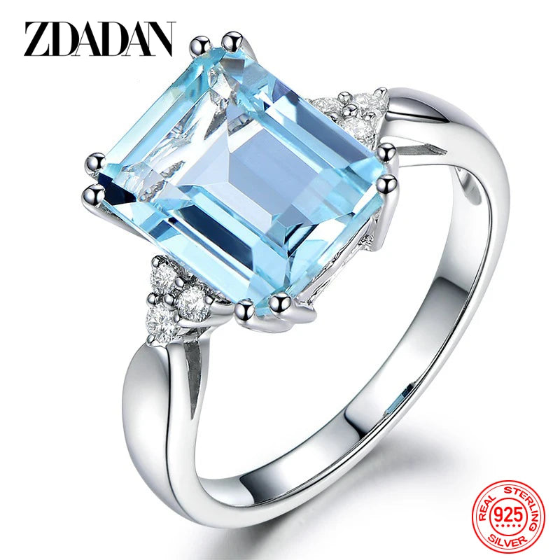 Elegant silver ring featuring a vibrant aquamarine gemstone, designed for women, by ZDADAN from Corporación Turística.
