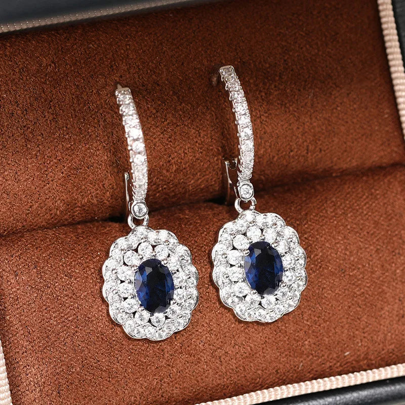 Sterling silver 925 hanging earrings with gemstone inlay, elegant jewelry by Corporación Turística.