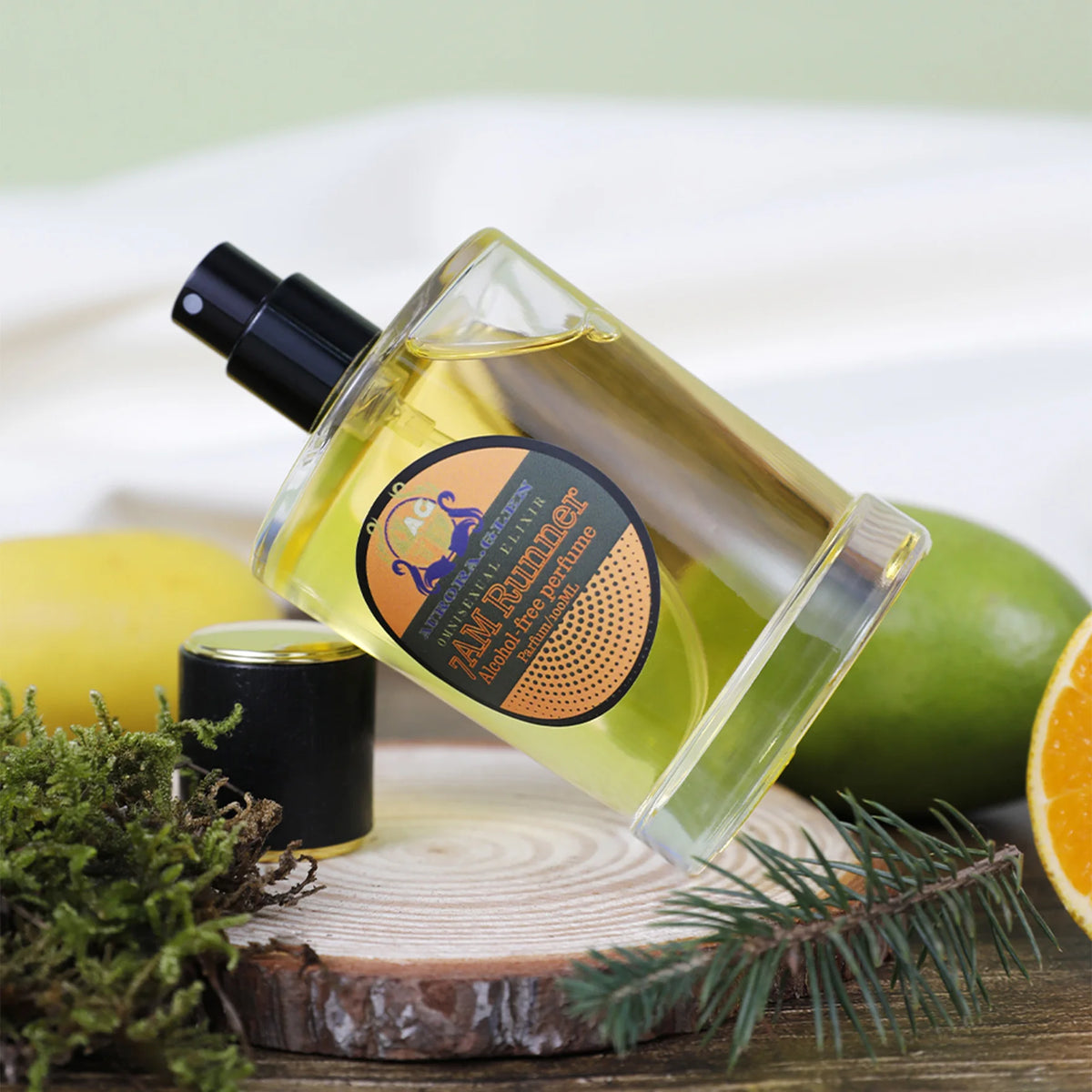 Essential oil spray with woody spicy fragrance by Corporación Turística, showing the spray bottle with a sleek design.
