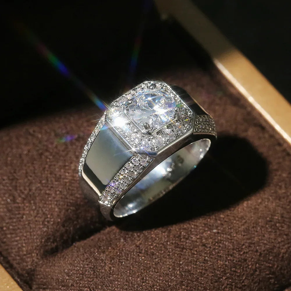 Elegant silver 925 wedding ring with a prominent gemstone, crafted by Corporación Turística, showcasing luxury and fine detail.