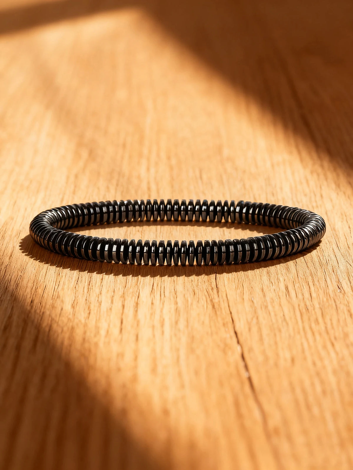 Hematite stone bracelet with rectangular natural stone beads, 19cm (7.5 inches) length, from Corporación Turística.