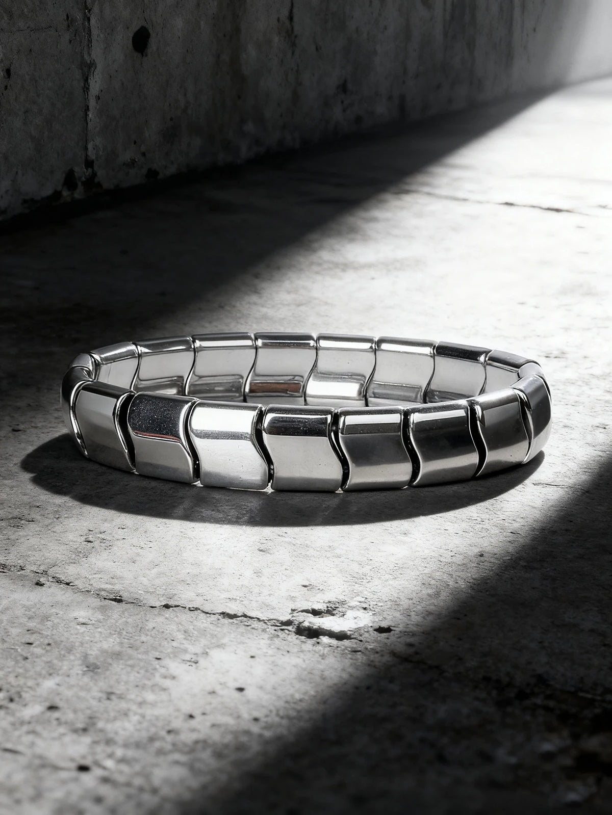 Hematite stone bracelet with rectangular natural stone beads, 19cm (7.5 inches), by Corporación Turística, on a neutral background.