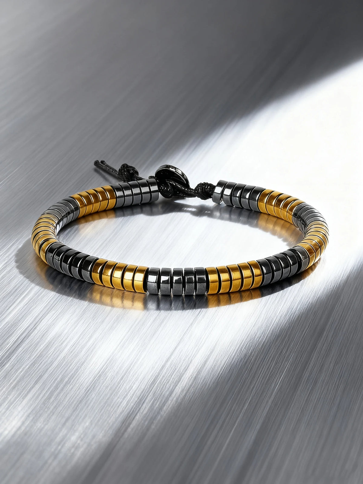 Hematite bracelet with rectangular natural stone beads, 19cm (7.5 inch), made by Corporación Turística.