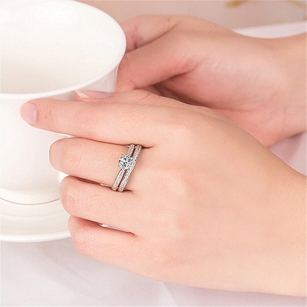 Sterling silver 925 ring with zirconia gemstones, elegant jewelry design from Corporación Turística.